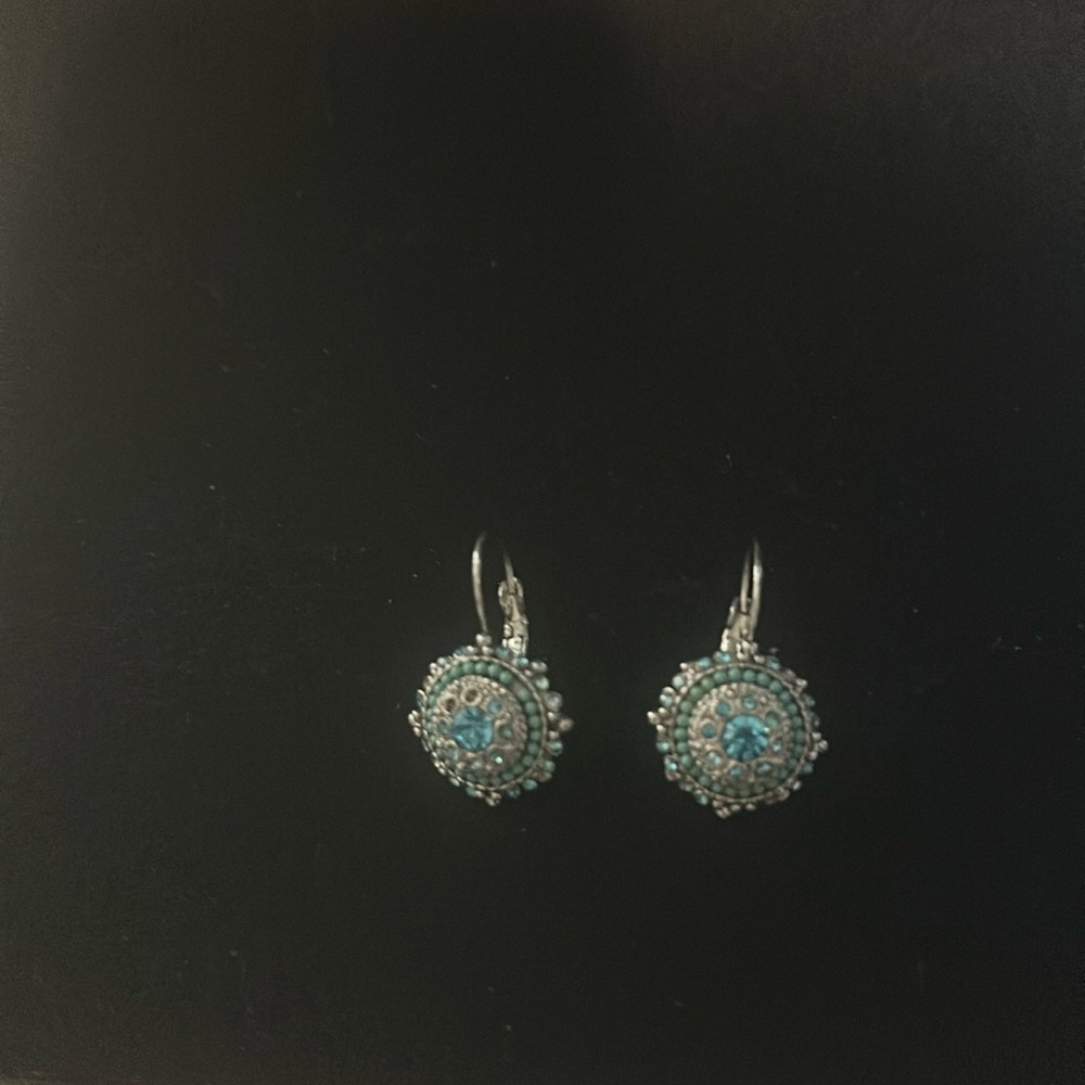 Sterling silver with teal accent